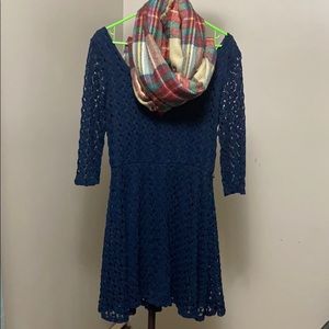 Women’s navy dress with scarf